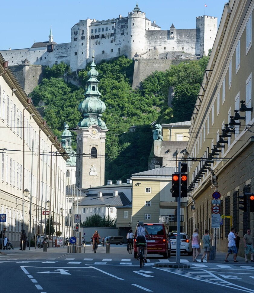 View of historic buildings and Hohensalzburg Fortress in Salzburg's old town.